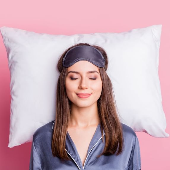 A girl sleeping in the bed