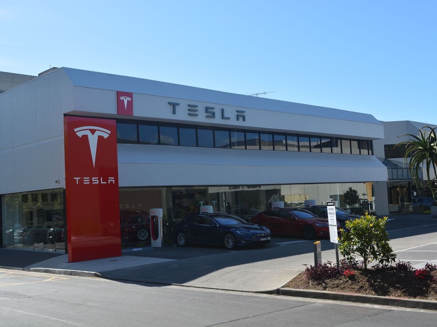 Exterior view of the Tesla showroom near Strahan Village