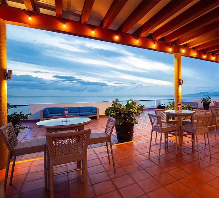 The dining area of Sky Bar Lounge at Plaza Pelicanos Grand Beach Resort