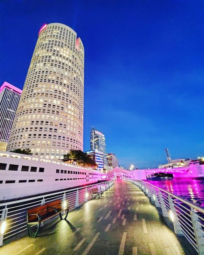 Tampa Riverwalk & city Illuminated at night near The Barrymore Hotel