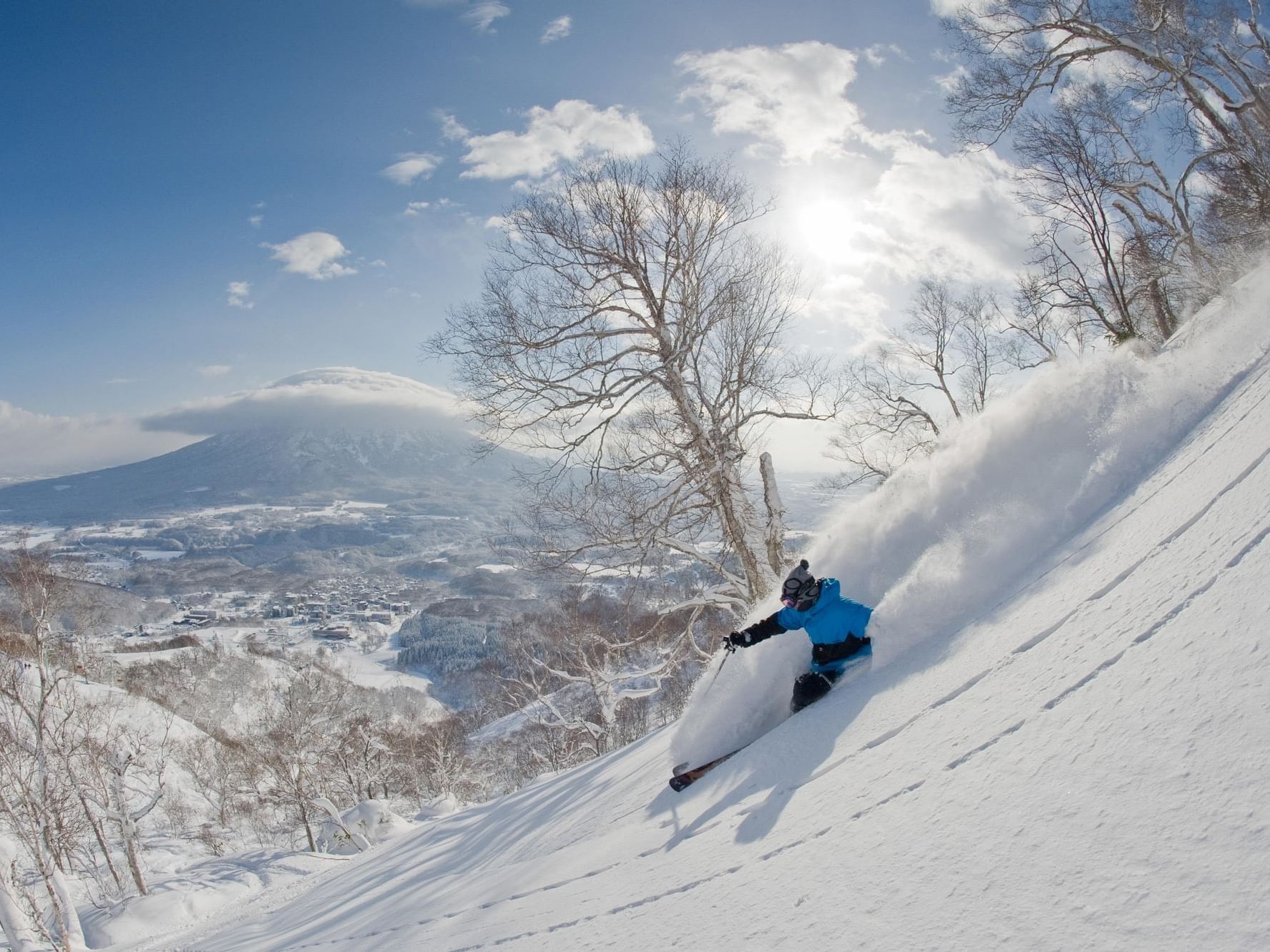 A person snowboarding near Chatrium Niseko japan