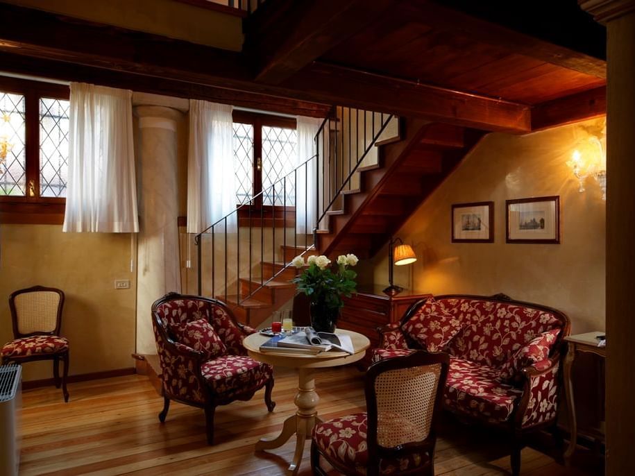 Loft Suite living room by the stairway at Hotel Bisanzio