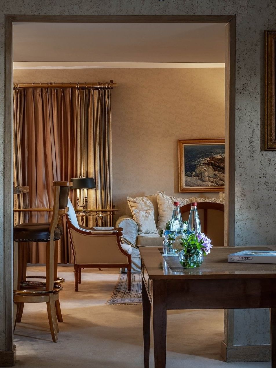 Working desk near the doorway to living area in Royal Suite at Warwick Grand Place Brussels