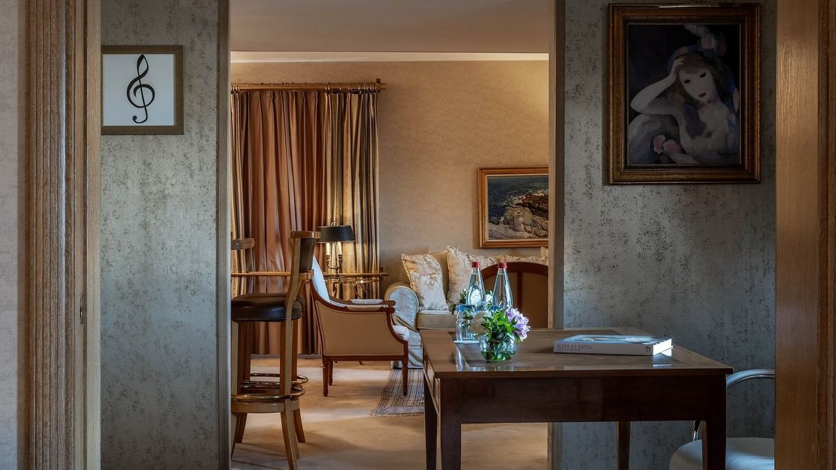 Working desk near the doorway to living area in Royal Suite at Warwick Grand Place Brussels