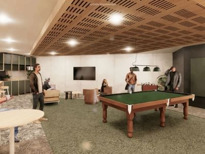 Interior rendering of a cozy lounge area with billiard table at UniLodge Brisbane City.