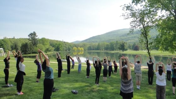 Outdoor morning yoga session at Honor’s Haven