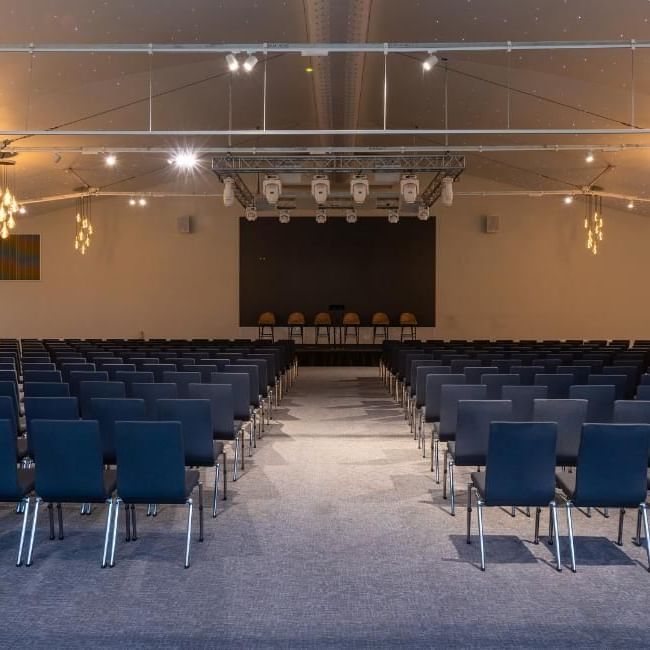 Theatre style seating arrangement for corporate event inside the King Suite at Easthampstead Park