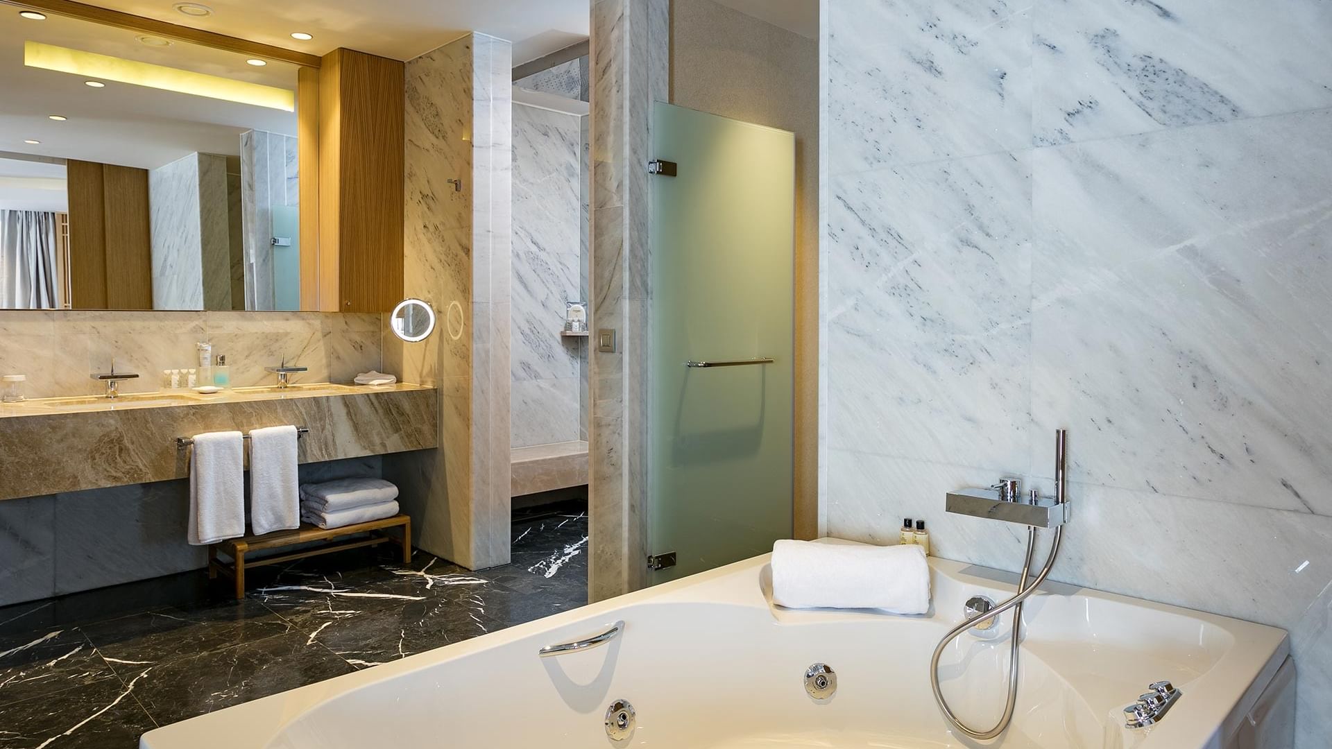 Bathroom bathtub by the vanity in Presidential Villa at Titanic Luxury Collection Bodrum