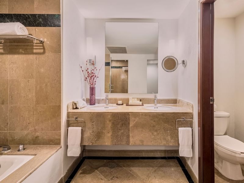 Bathroom vanity & tub in Governor Suite at FA Hotels & Resorts