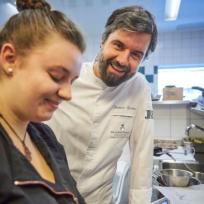 Chefs in the kitchen at Falkensteiner Hotels and Residences