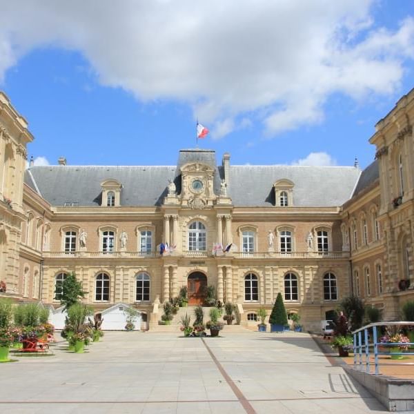 Exterior view of Amiens City Hall near Originals Hotels