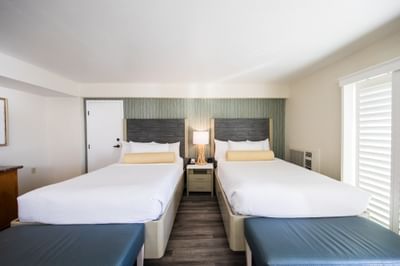 two beds in a hotel room