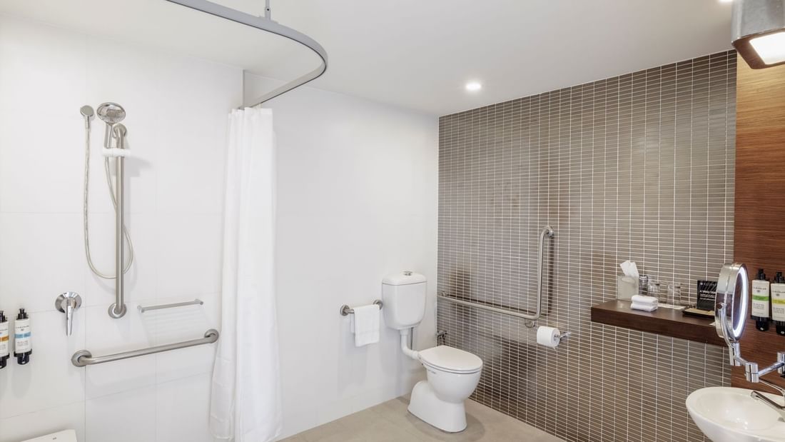 Shower area with lavotery in Pullman Superior King Accessible bathroom 351 at Pullman Sydney Olympic Park