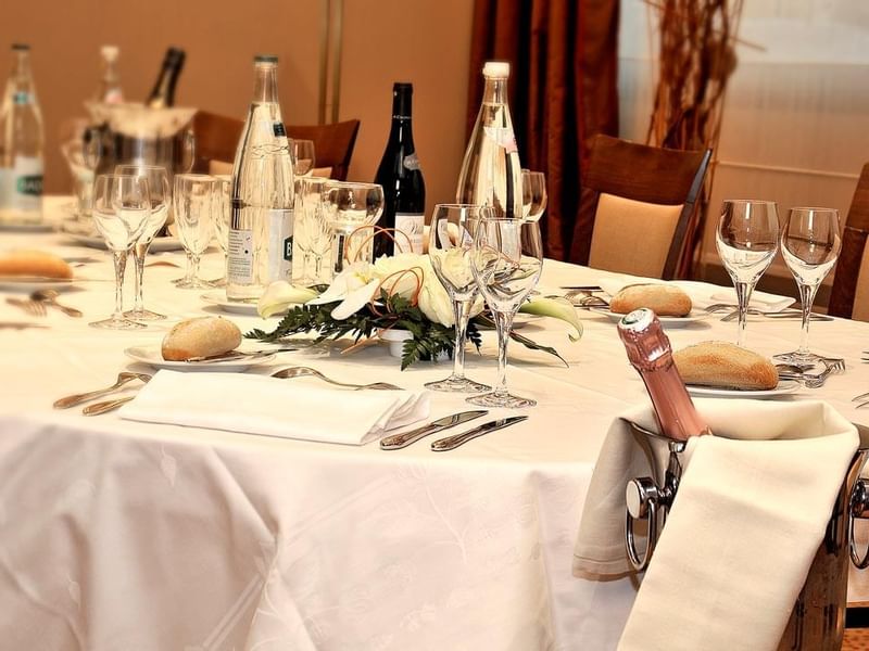 Banquet table set up for an event at Warwick Reine-Astrid