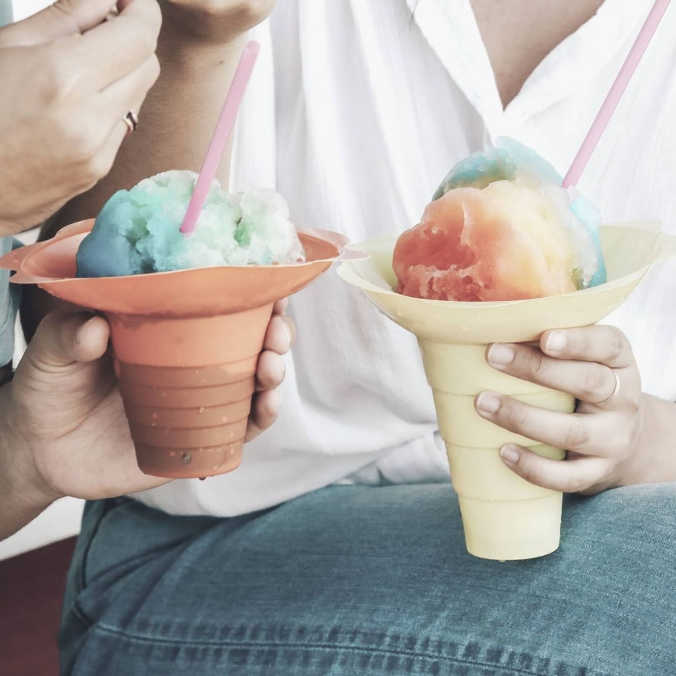 Close-up of a couple sharing shaved ice dessert near Waikiki Resort Hotel by Sono