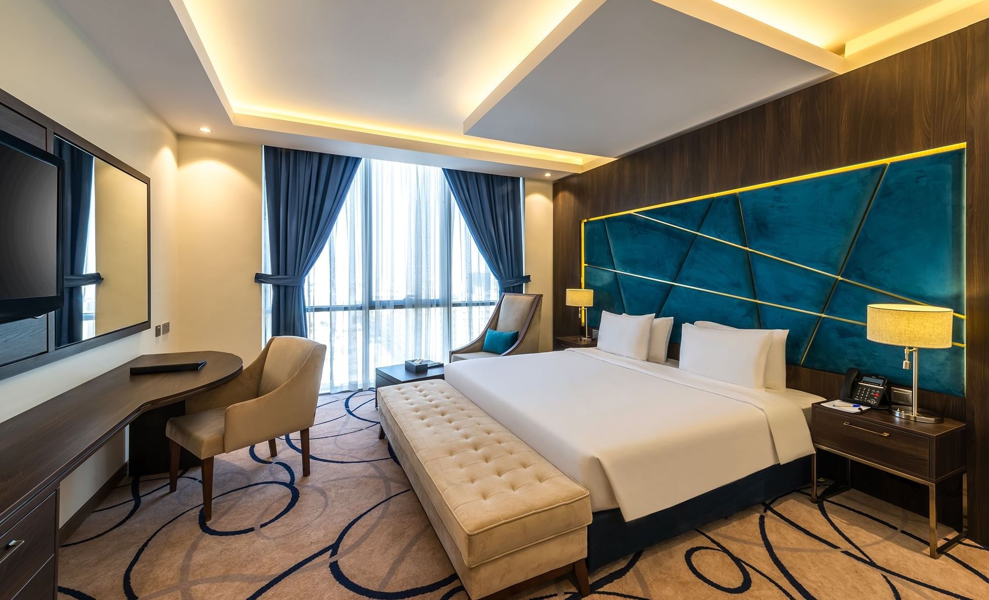 Standard Room with cozy bed with working area at Warwick Riyadh