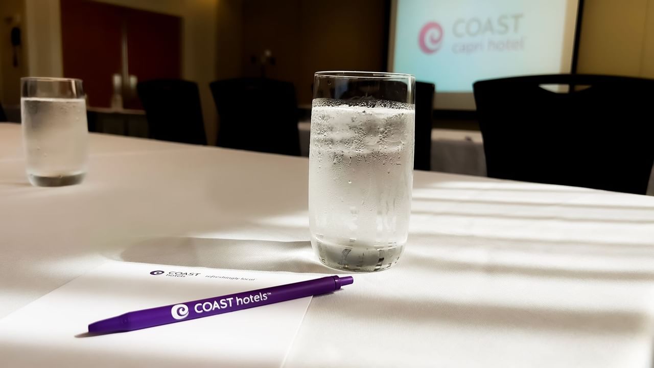 Coast pen and water on table top