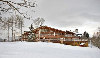 Exterior view of the backyard in the winter at Stein Eriksen Lodge