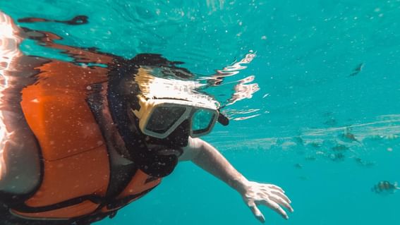 Man snorkeling near H2O Life Style Resort