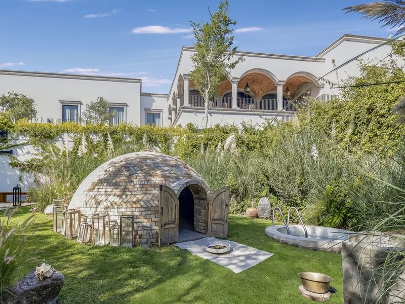 Stone house & a small igloo in the garden at Live Aqua San Miguel de Allende