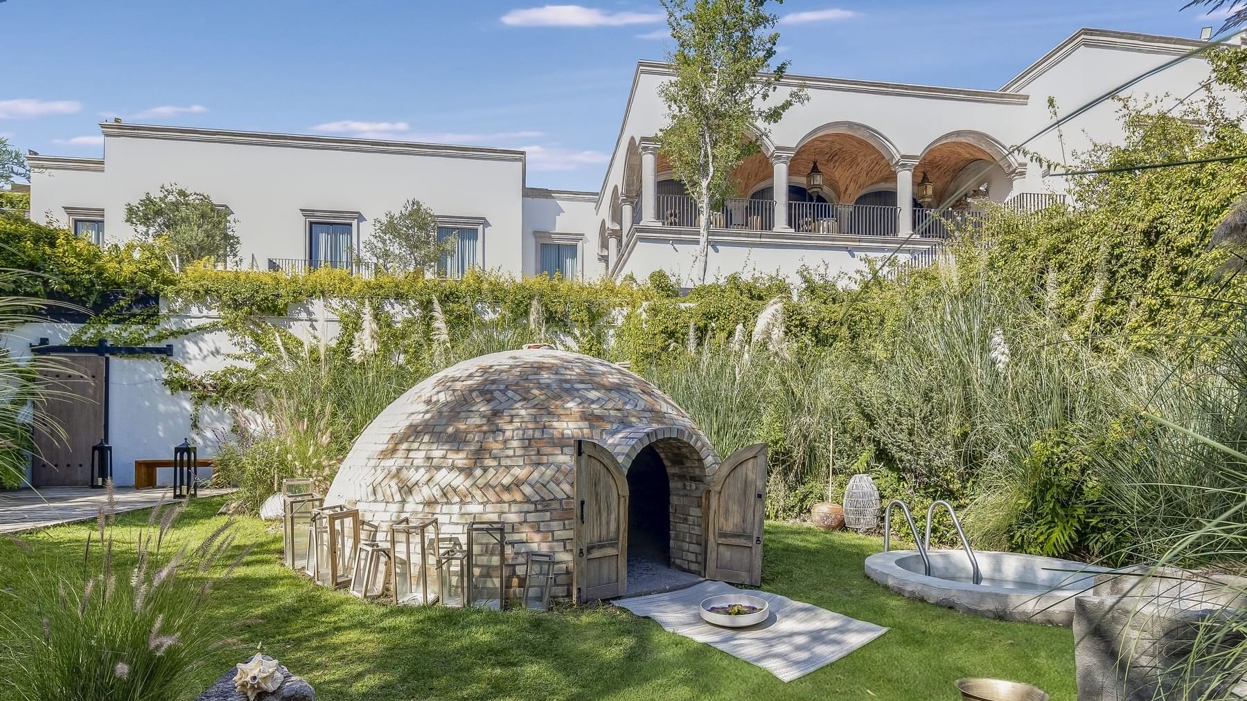 Stone house & a small igloo in the garden at Live Aqua San Miguel de Allende