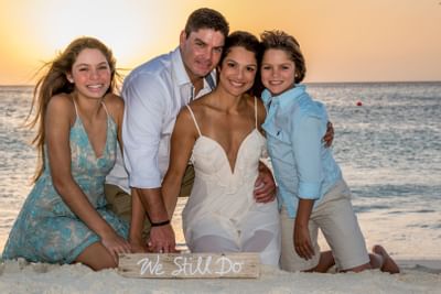 Close-up on a family posing by the beach at Amsterdam Manor