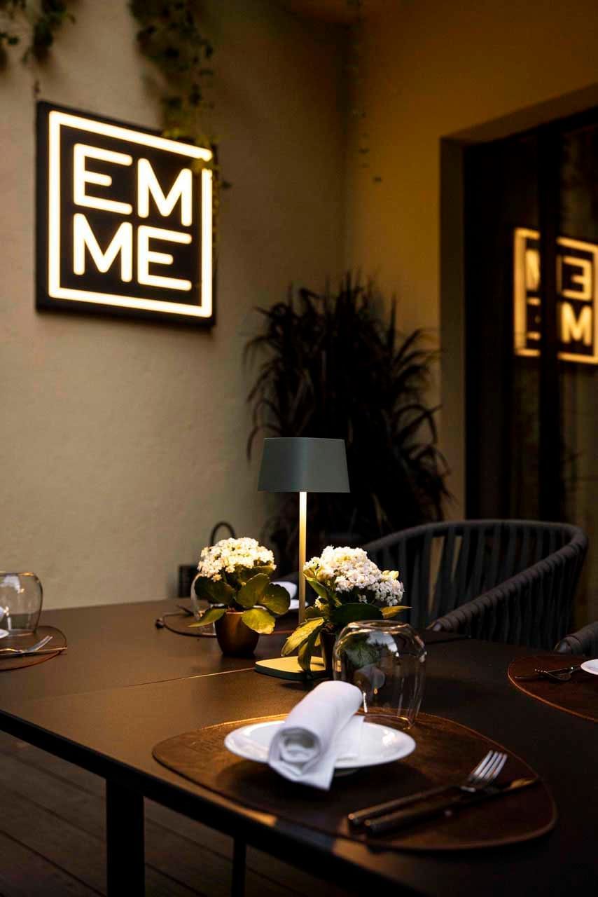 EMME Restaurant signpost & dining table featuring table lamp at Margutta 19