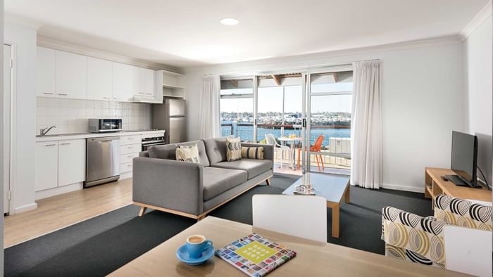 Living area and pantry area in an apartment at Be Fremantle