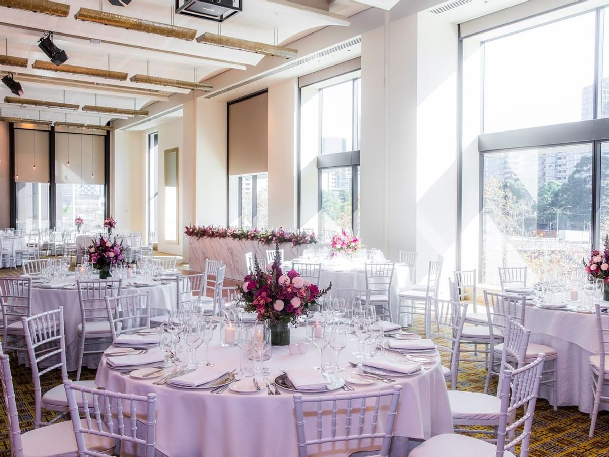 Banquet tables arranged in Garden Room at Crown Melbourne hotel