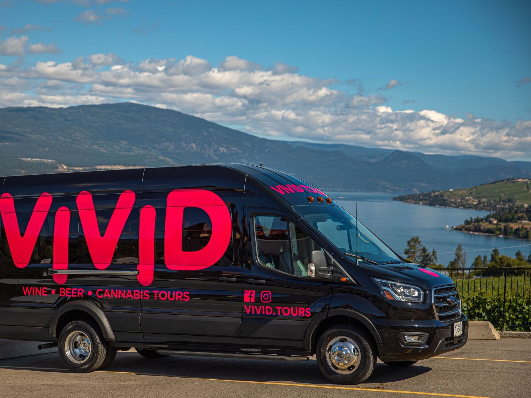 Vivid tours van by a mountain range view near Hotel Eldorado