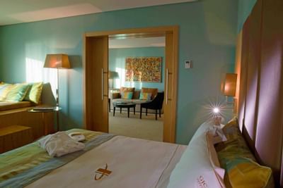 Bedroom & living area in Premium Suite at Hotel Presidente Luanda