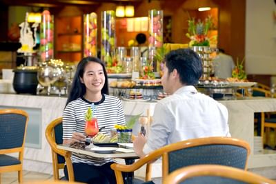 Couple enjoying a meal at Aqua Coffee House - Lexis Port Dickson
