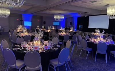 Banquet table set-up in a wedding hall at Ethan Allen Hotel