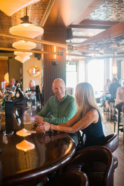 Couple at a bar in Eldorado Lounge.