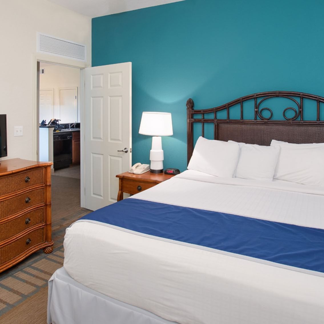 King bed & TV in 3 Bedroom 2 Bath Firework View Suite at Lake Buena Vista Resort Village & Spa