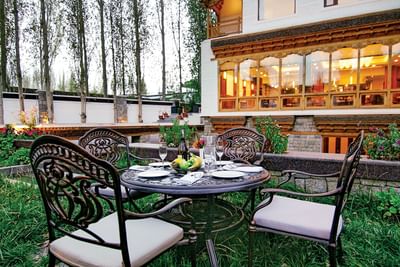 Dining table arranged in the Garden at The Indus Valley, food in Leh Ladakh
