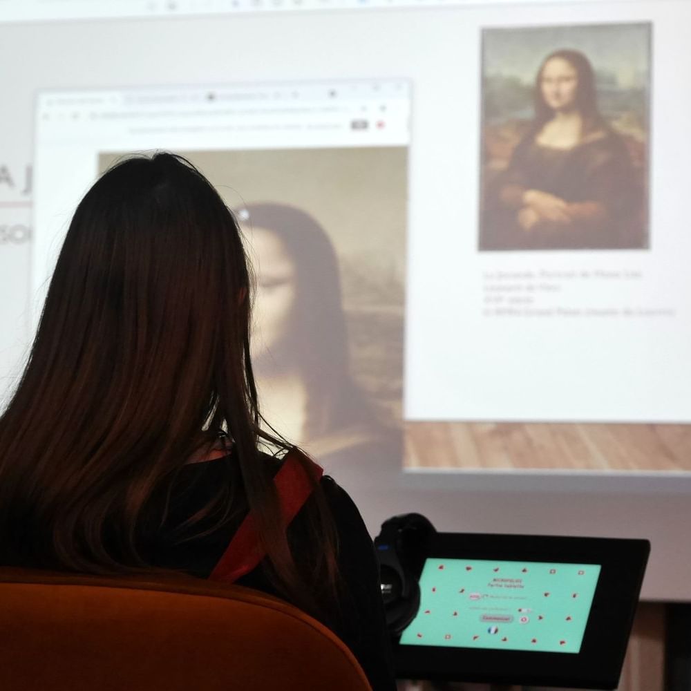 Mona Lisa image on screen, digital museum near Originals Hotels