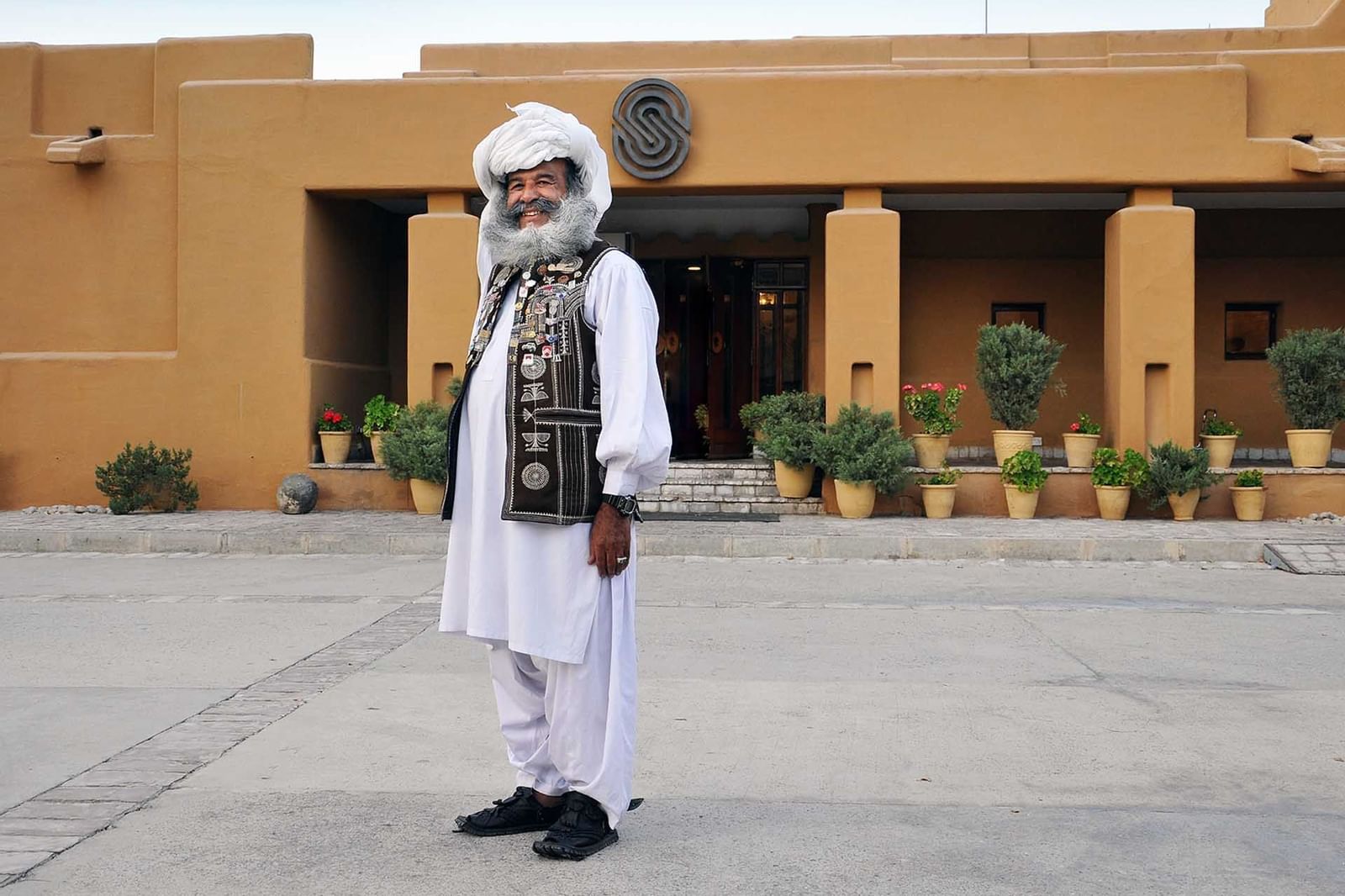 A local in front of the Hotel at Quetta Serena Hotel