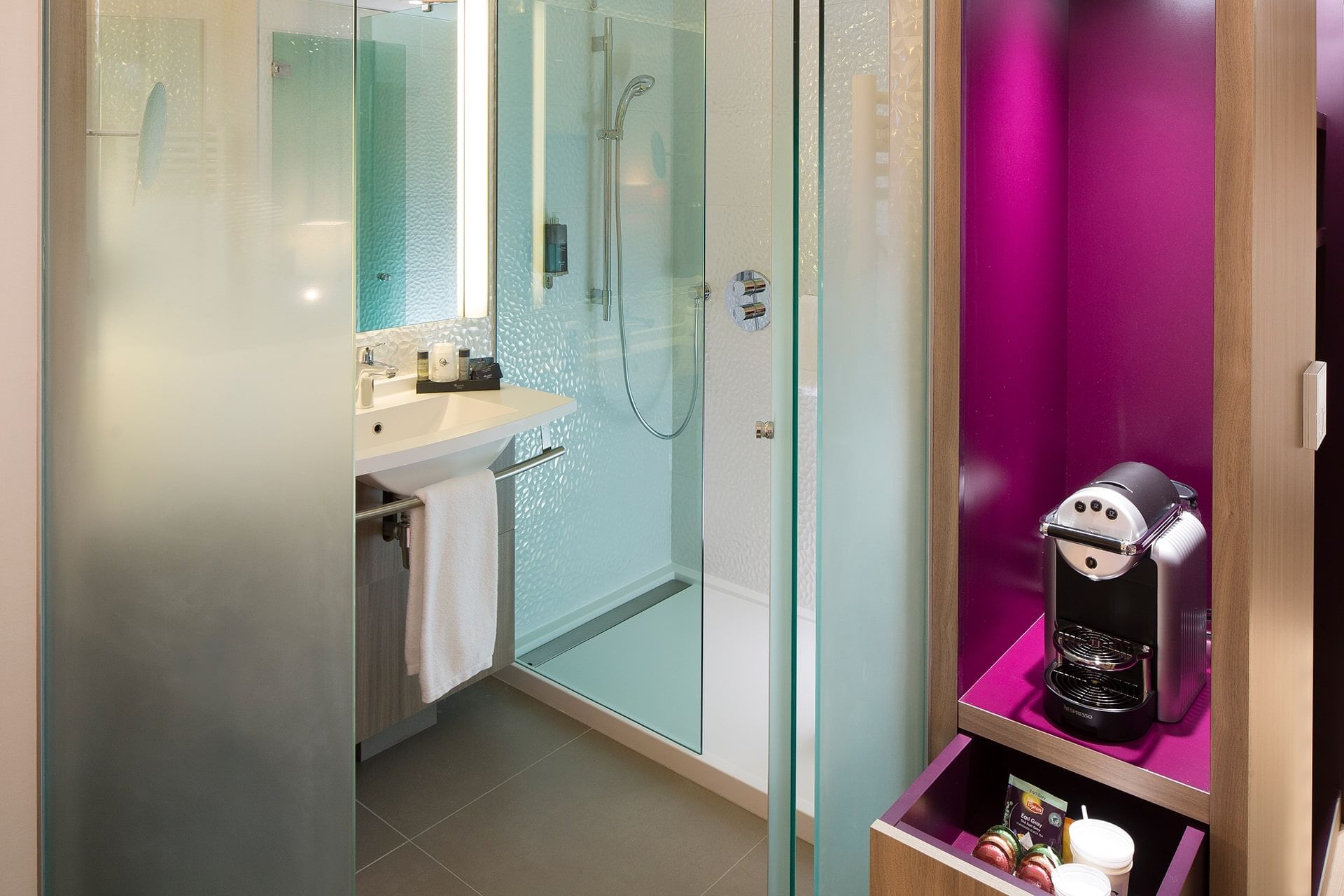 Vanity & shower area in a room at Oceania Rennes