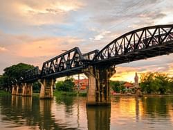 River Khwae Bridge at dawn near Hop Inn Hotel