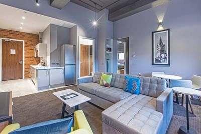 The living area and the pantry area in a room at the Sandman Sig