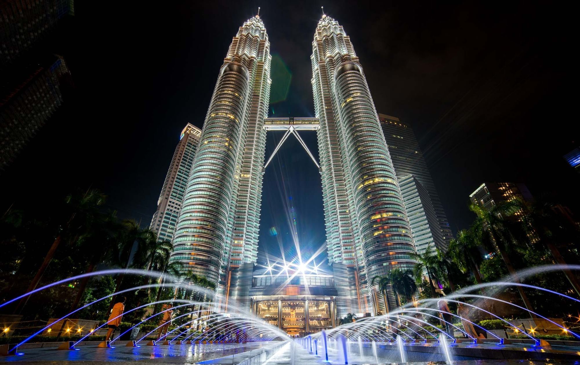Petronas towers captured at night near Sunway Hotel Pyramid
