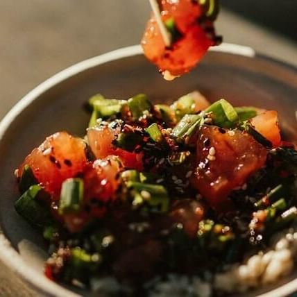 Close-up of a ceviche bowl served in a Restaurant at Waikiki Resort Hotel by Sono