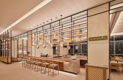 Cafe with bar chairs in Trattoria restaurant at Eastin Hotels