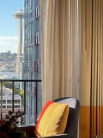 View from the Magnolia Suite balcony with Space Needle in the background at Warwick Seattle