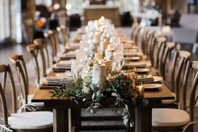 Head table with candle decor of a wedding at Stein Eriksen Lodge