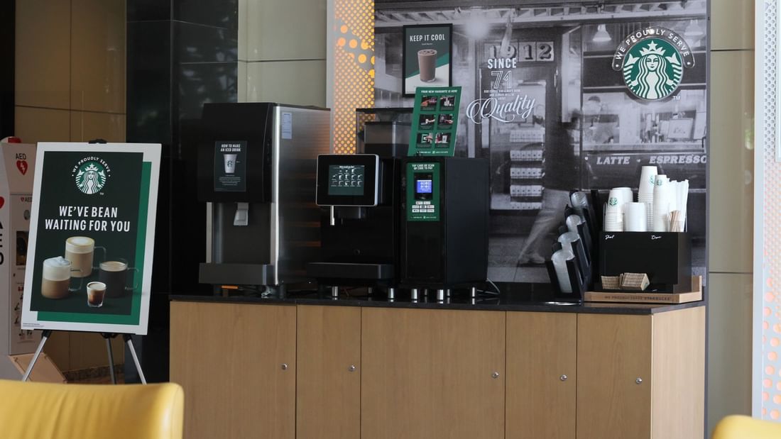 A self-service coffee station with Starbucks branding at Sunway Velocity Hotel