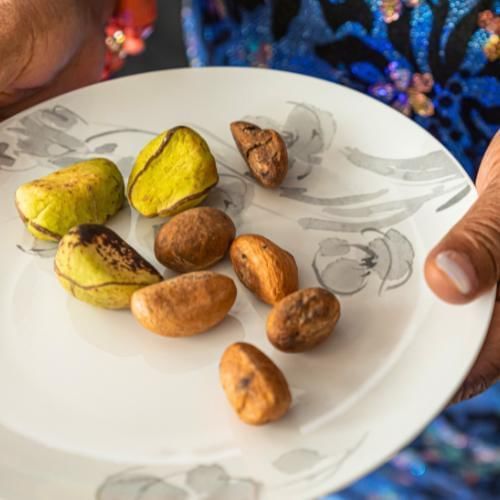 Exchanging kola nuts, a popular African wedding tradition