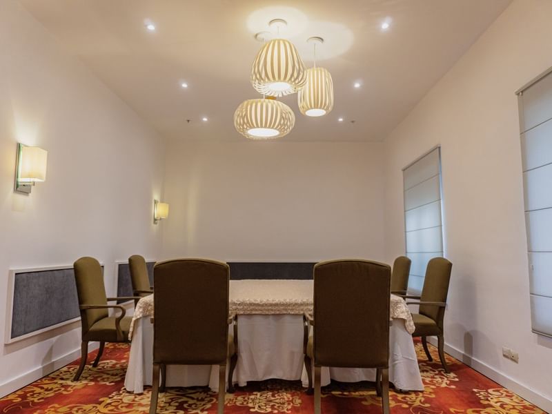 Conference table and chairs in Don Arturro Room at Gamma Hotels