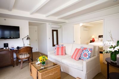 Work desk by TV lounge area in Descanso and Moonstone Suites at Pavilion Hotel Catalina Island